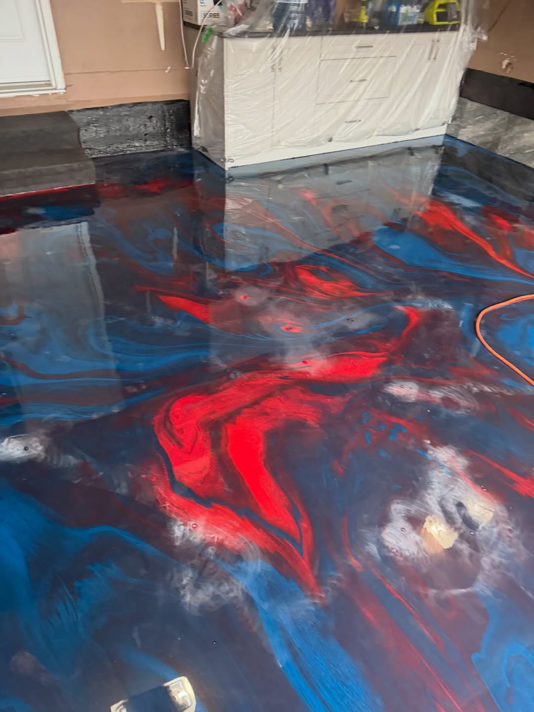 Metallic epoxy flooring with high gloss finish