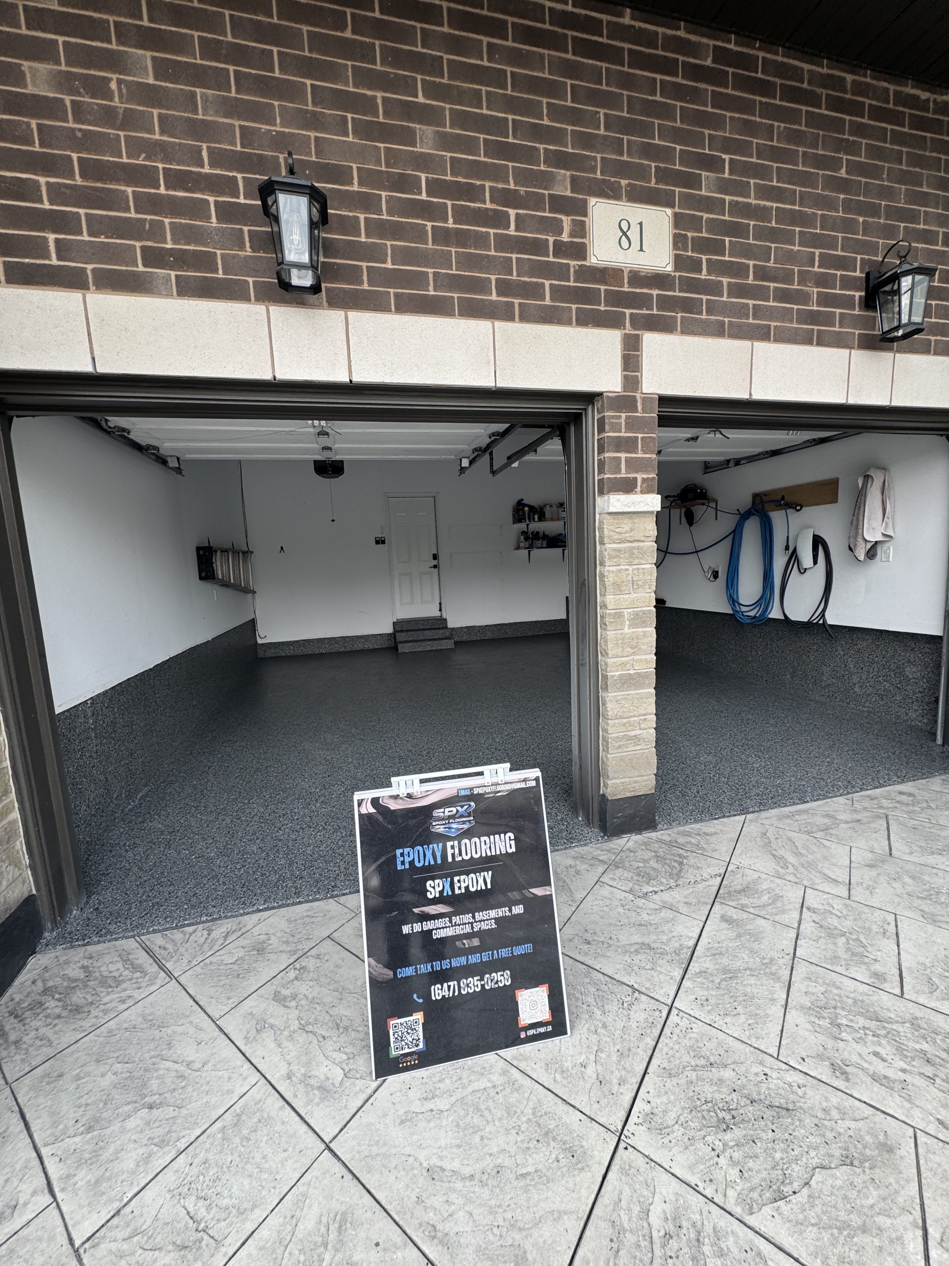 Glossy epoxy flooring installation in a clean garage