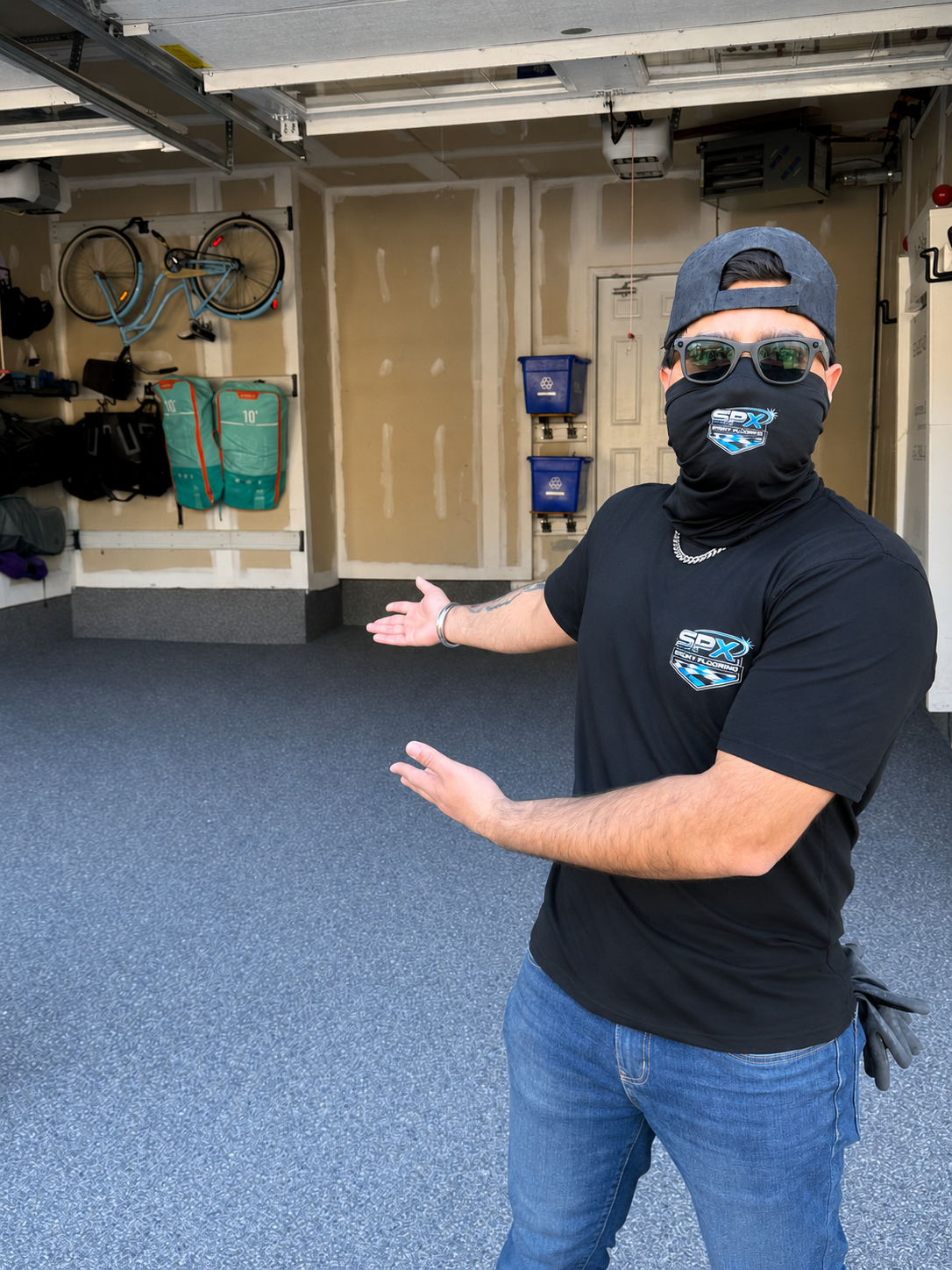Glossy epoxy flooring installation in a clean garage